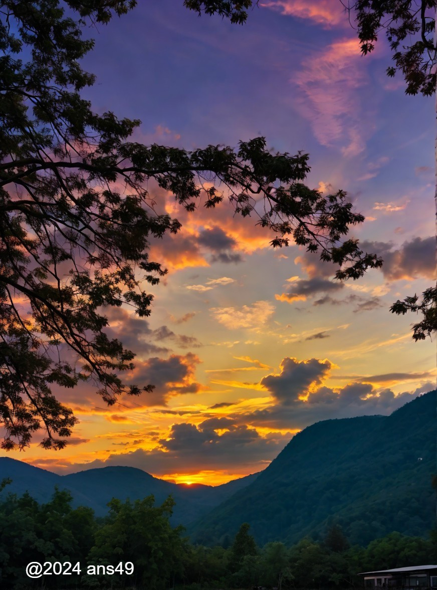 Vibrant Sunset Over Hills with Silhouetted Trees