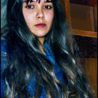 Portrait of a Young Woman with Dark Hair and Scarf