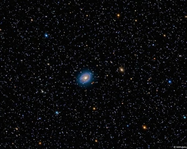 Distant Galaxy with Stars and Celestial Bodies