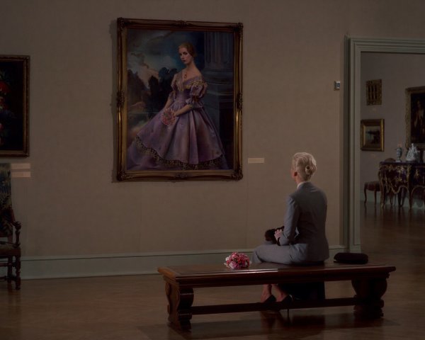 Woman Contemplating Large Painting in Art Gallery