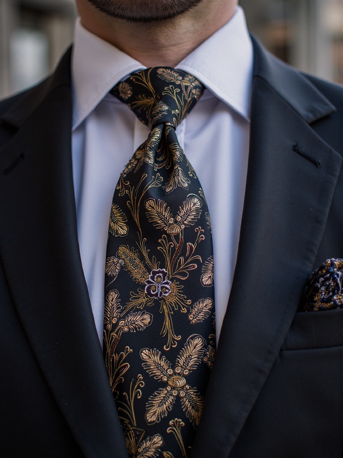 Close-Up of Man in Formal Attire with Floral Tie