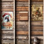 Rustic Wooden Wall with Vintage Rodeo Posters