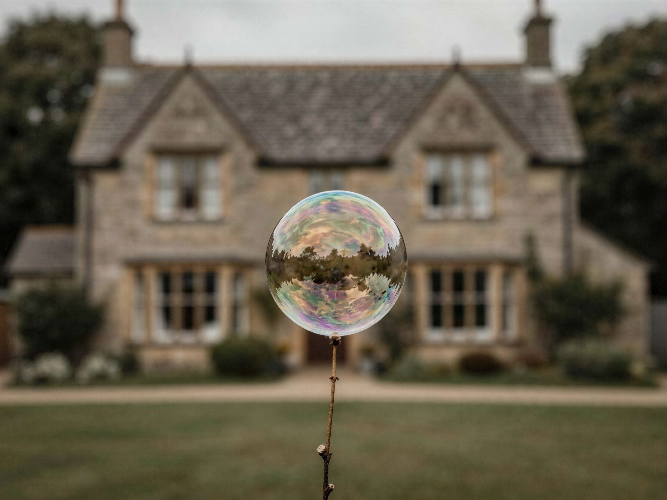 Translucent Soap Bubble on a Stick with Blurred Background