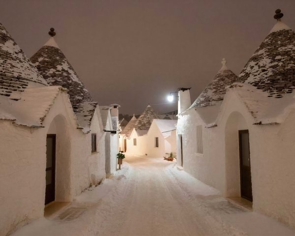 Snowy Night Streets of Alberobello, Italy
