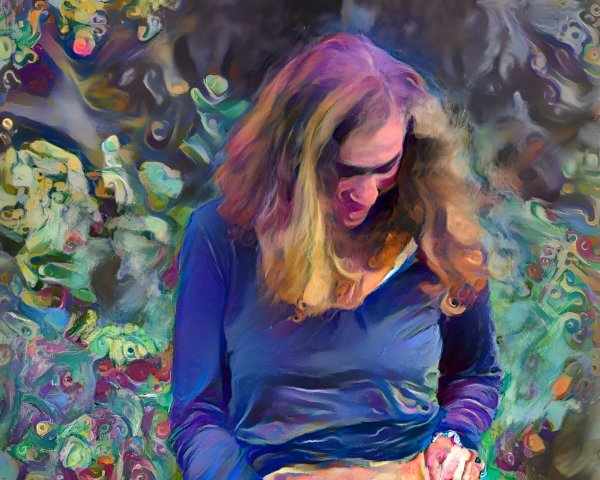 Woman in Blue Top Against Colorful Abstract Background