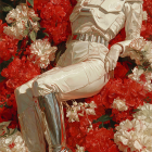 Stylish Figure on Red Fabric with Floral Design
