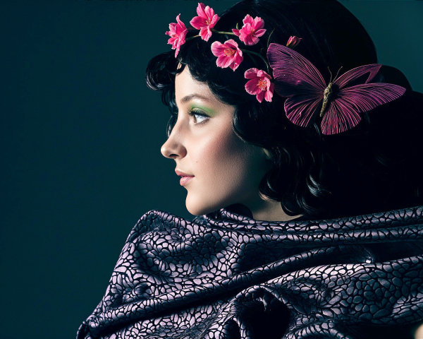 Profile of a Woman with Floral Accents and Shawl