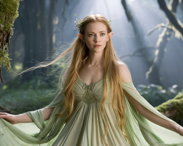 Serene Elf in a Misty Forest with Sunlight Filtering