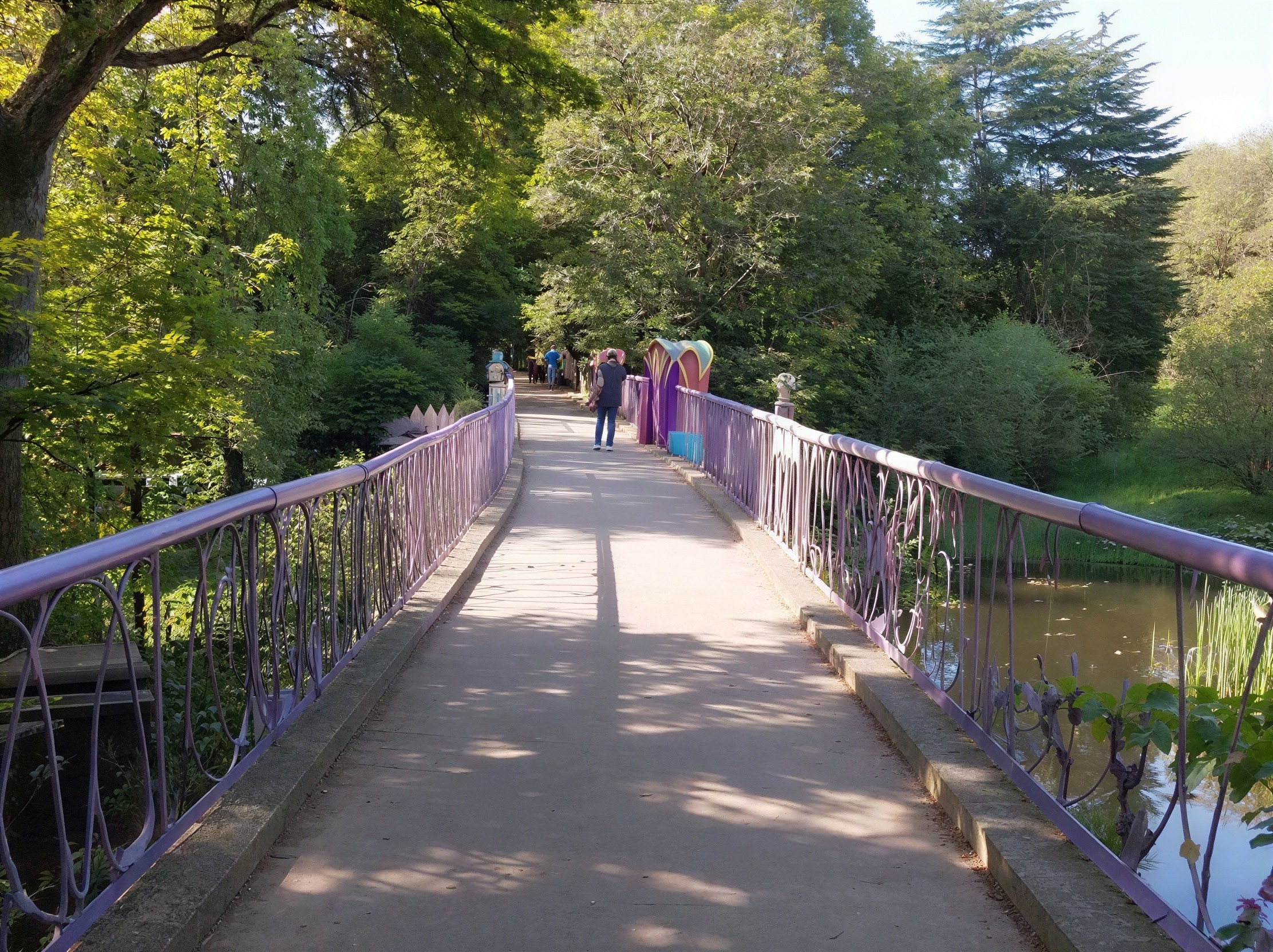 Urban Landscape Featuring Stone Bridge in Park