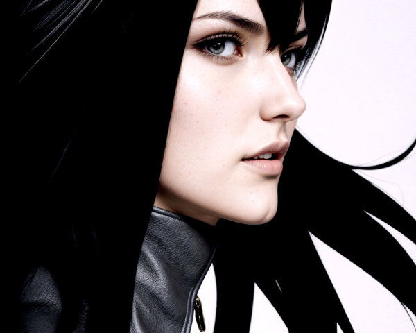 Close-Up Profile of a Woman in Black Leather Jacket