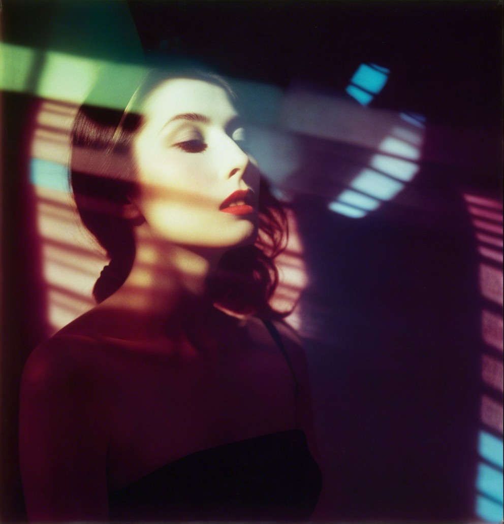 Portrait of a Woman with Colorful Light Patterns