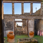 Colorful Ceramic Pots on Windowsill with Scenic View