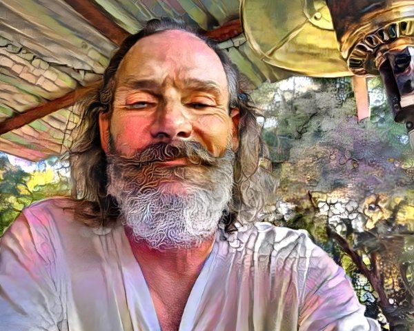 Man with Long Hair and Beard in Outdoor Setting