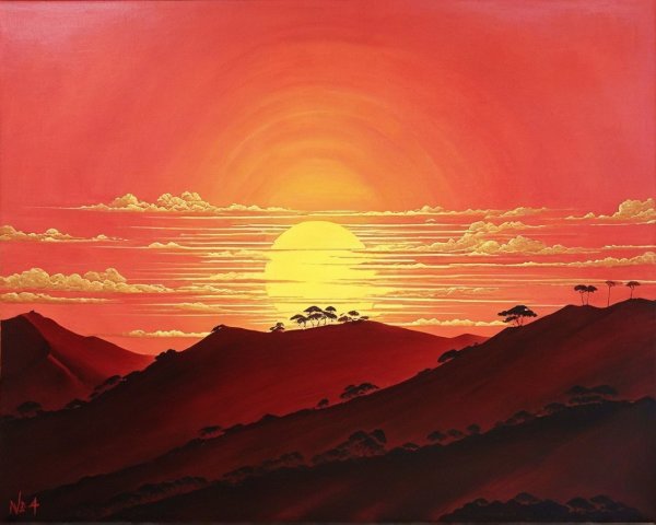 Vibrant Sunset Over Rolling Hills and Silhouetted Trees