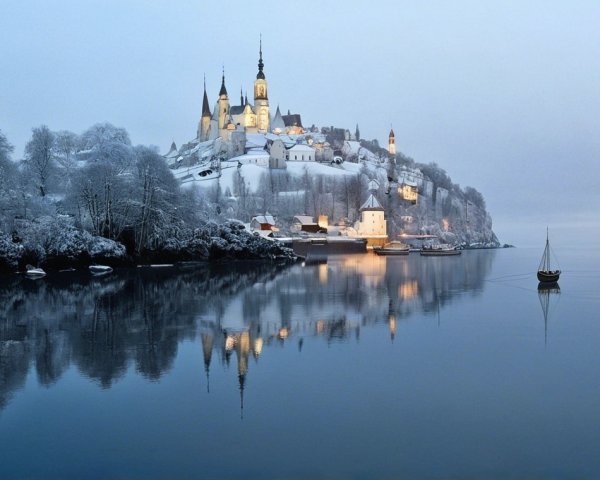 Snow-Covered Castle in a Serene Winter Landscape