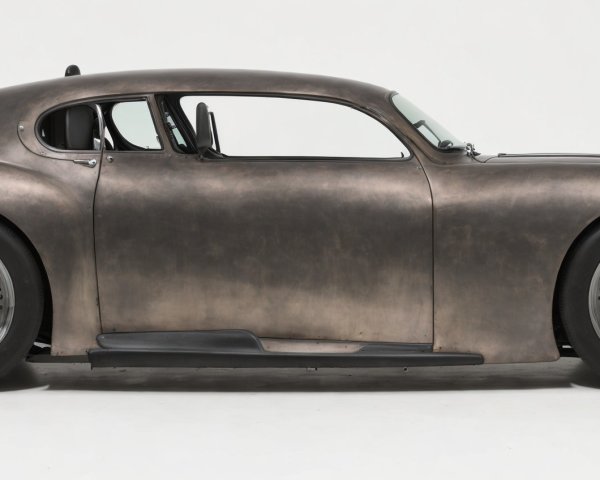 Vintage-Inspired Sports Car with Matte Brown Finish