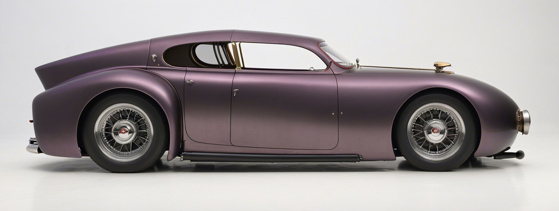 Vintage Car with Matte Purple Finish and Sleek Design