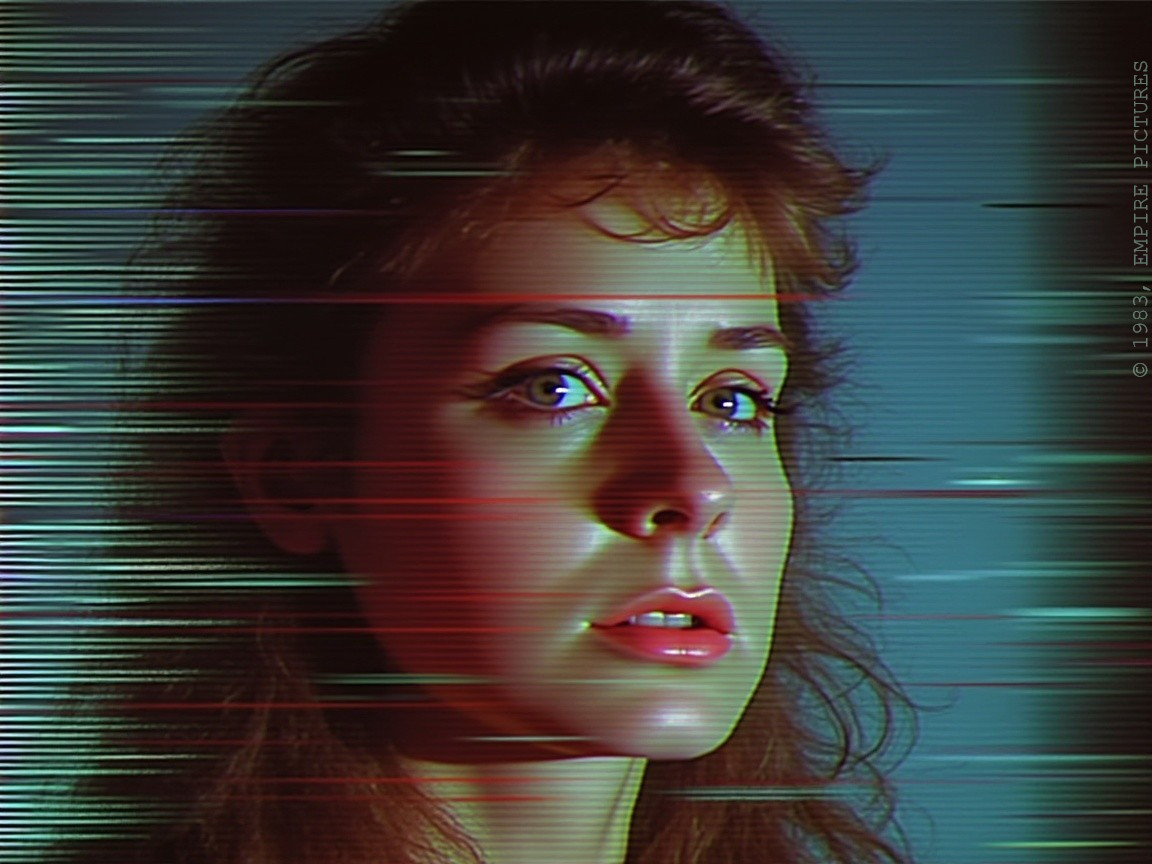 Close-up of a woman's face with colorful lighting effects