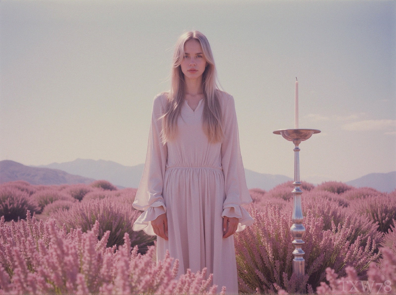 Young Woman in Lavender Fields with Candle Holder
