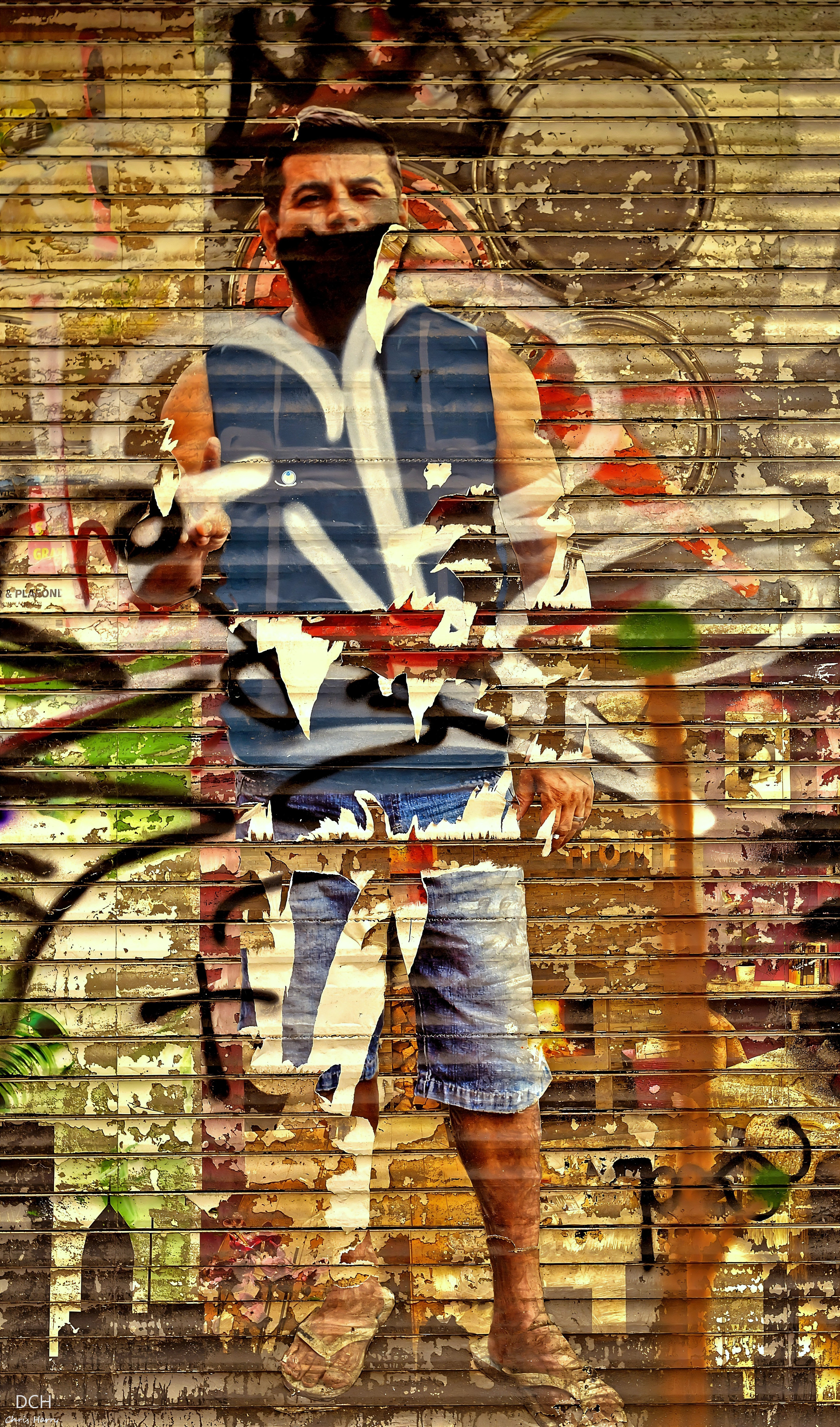 Man in Blue Vest Against Graffiti Wall Background