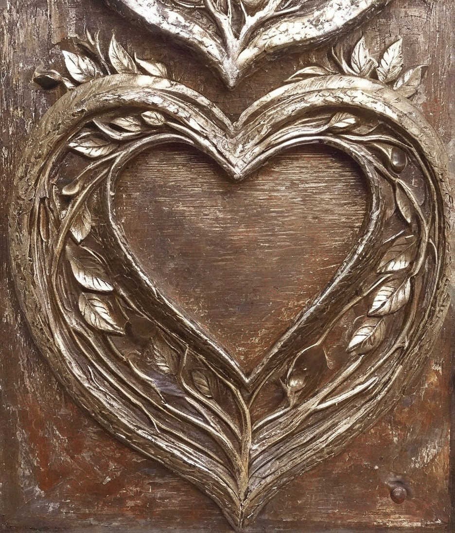 Ornate Heart-Shaped Relief Sculpture with Leaf Patterns