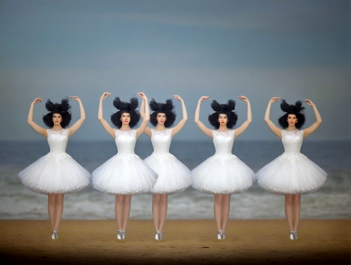 Five Figures in White Tutus on Sandy Beach