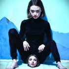 Surrealistic Painting of a Woman with Severed Head