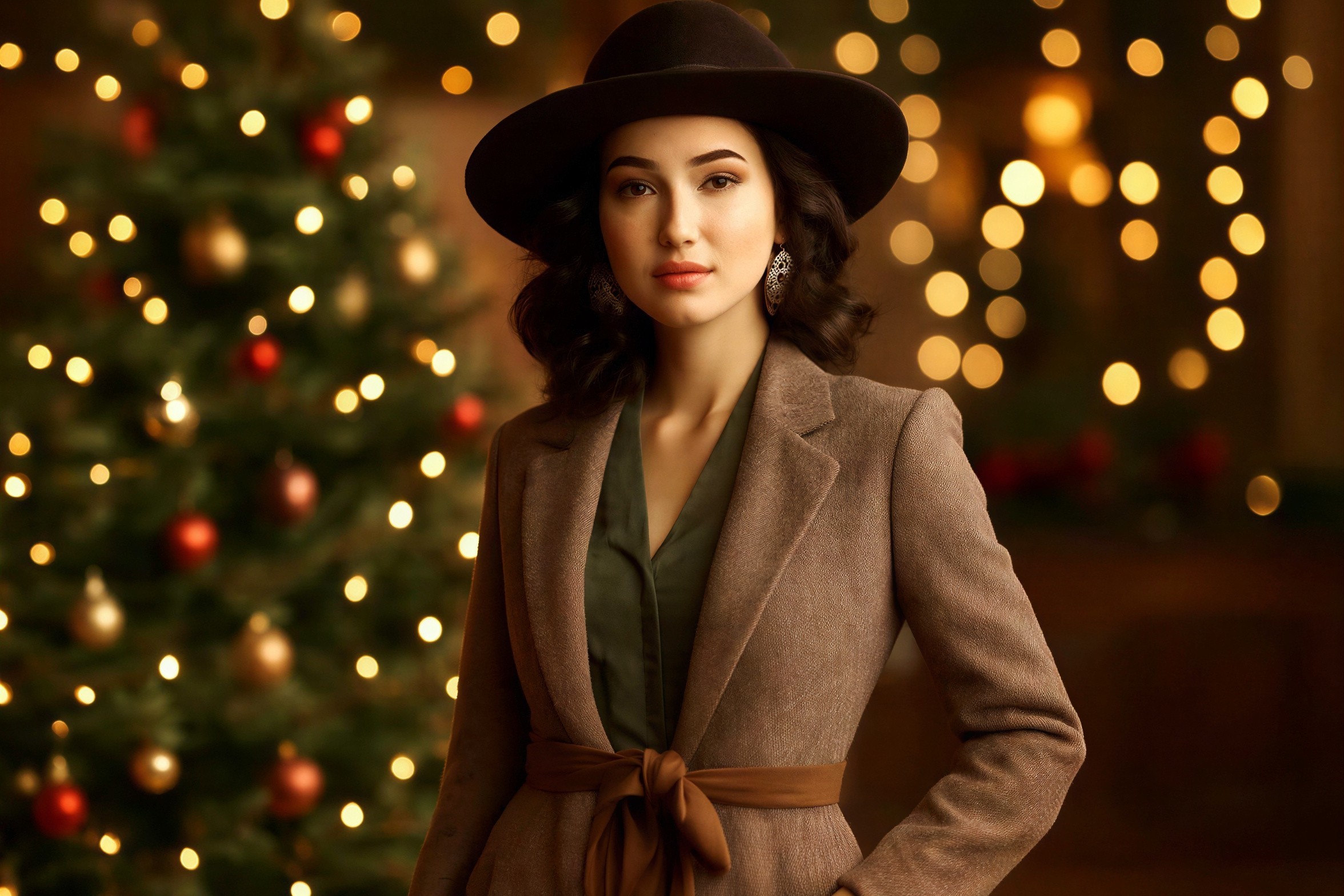 Woman in Brown Hat and Coat by Christmas Tree