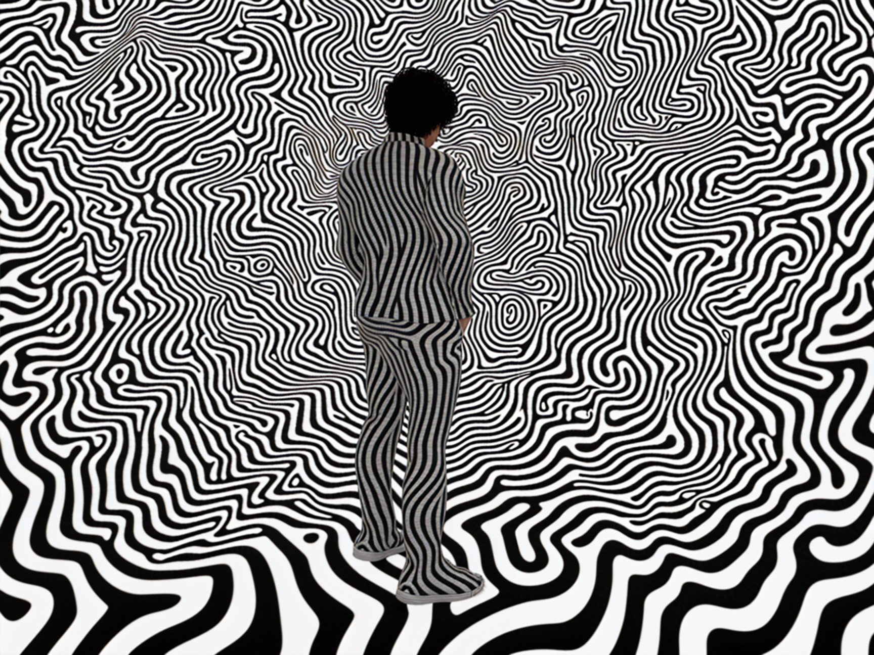 Striking Figure in Black and White Striped Suit