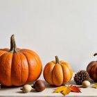 Rustic Wooden Table with Three Decorative Pumpkins