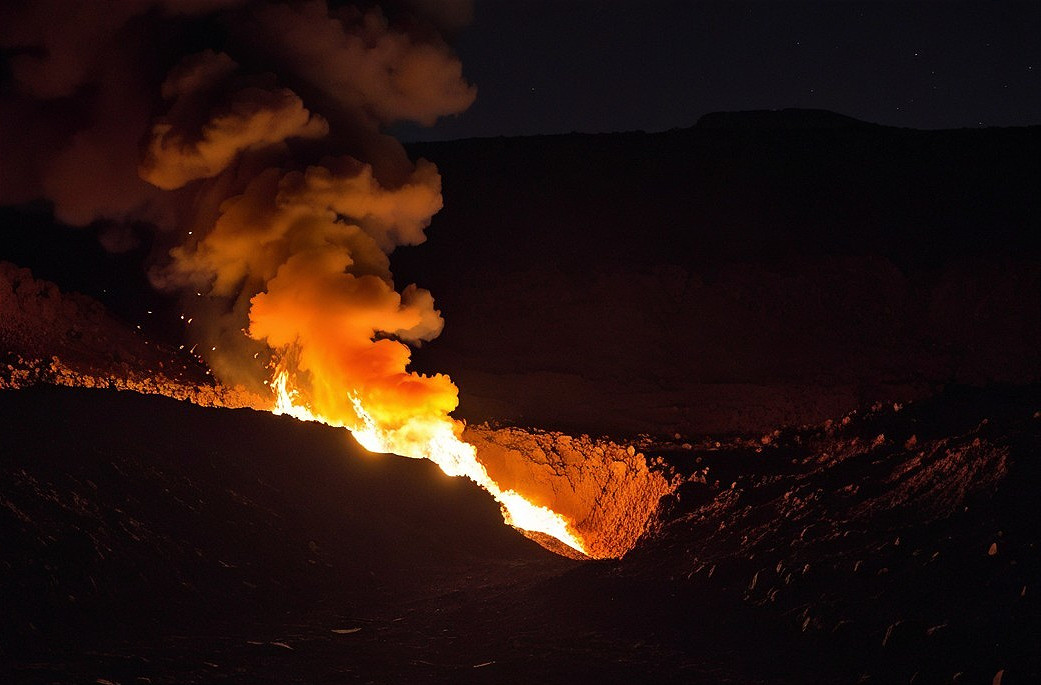 Volcanic Eruption at Night with Molten Lava Flow