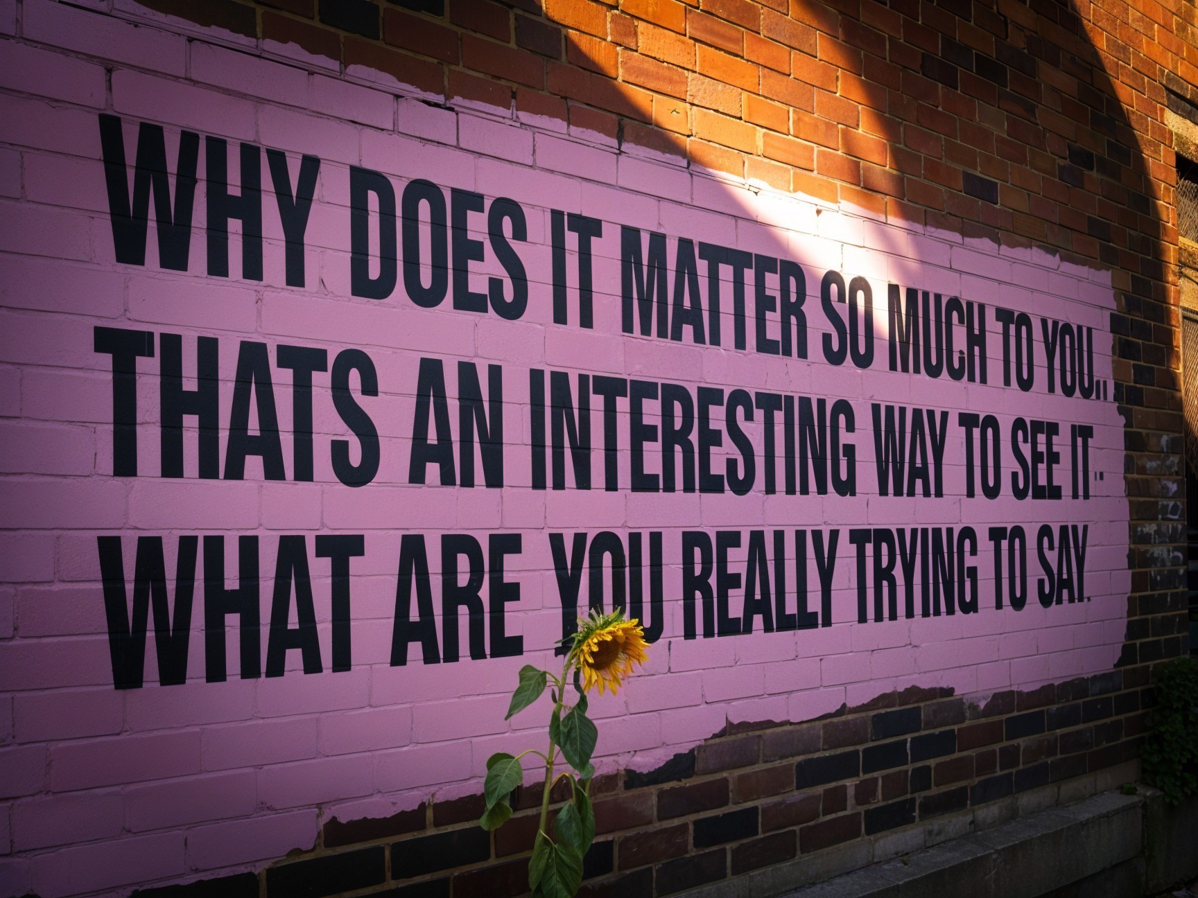 Vibrant Pink Mural with Bold Text and Sunflower