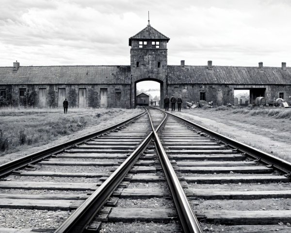 Entrance to Auschwitz with Railroad Tracks and Gatehouse