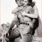 Black-and-white photo of a man and woman in embrace