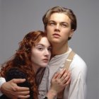 Young couple in vintage attire expressing deep emotion