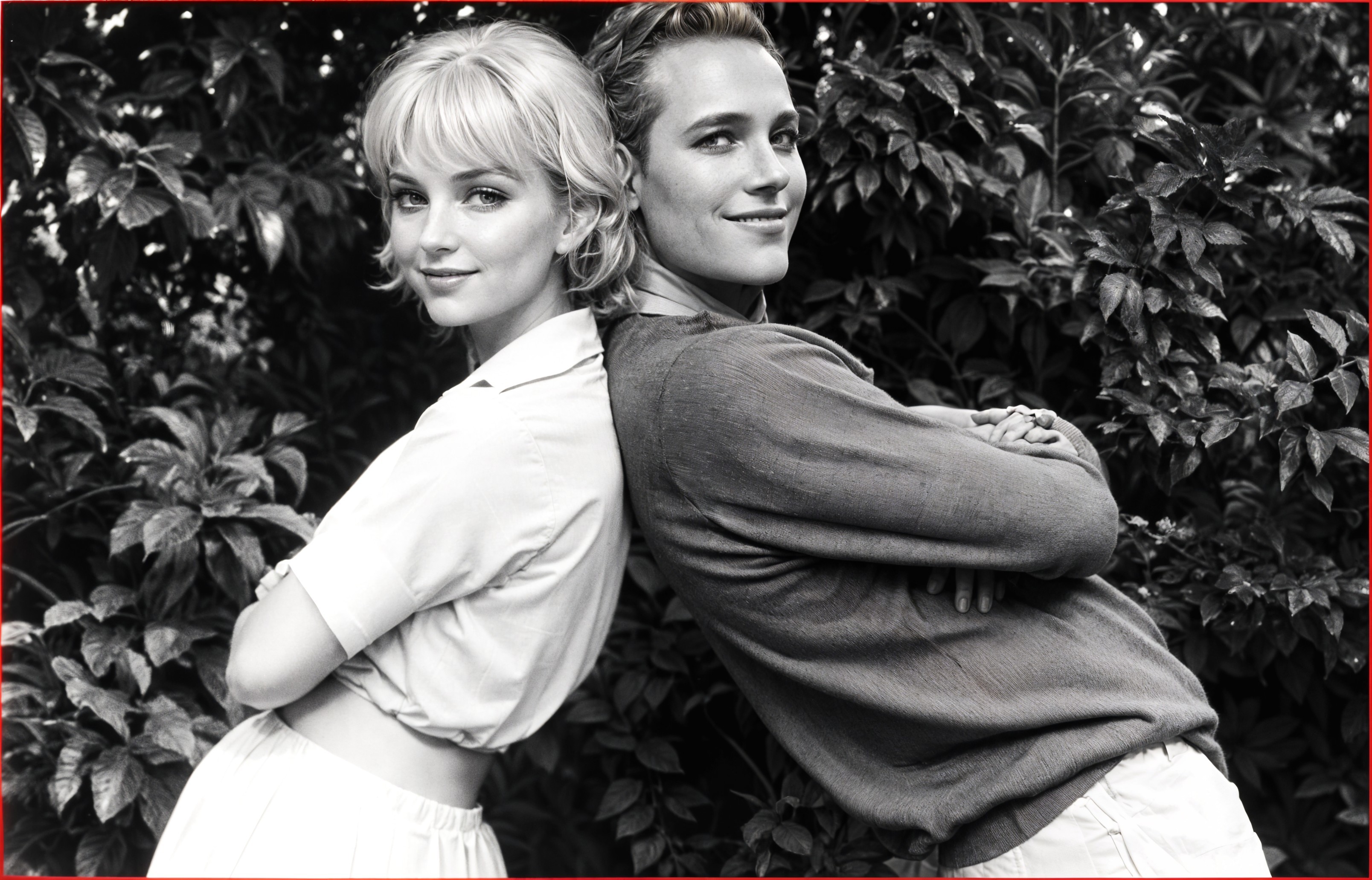 Stylish Individuals in Black-and-White Photo Outdoors