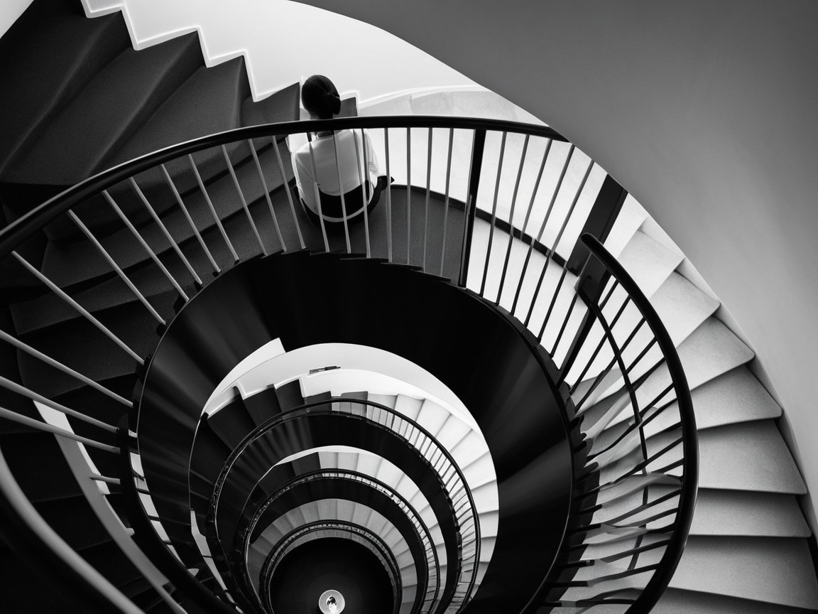 Monochromatic Overhead View of Spiraling Staircase