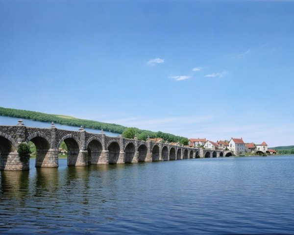 Medieval Bridge of Besalú Over Tranquil Lake