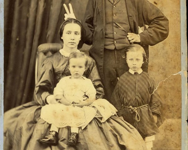 Vintage Sepia-Toned Family Portrait with Children