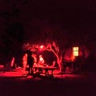 Eerie Room with Solitary Figure in Black Dress