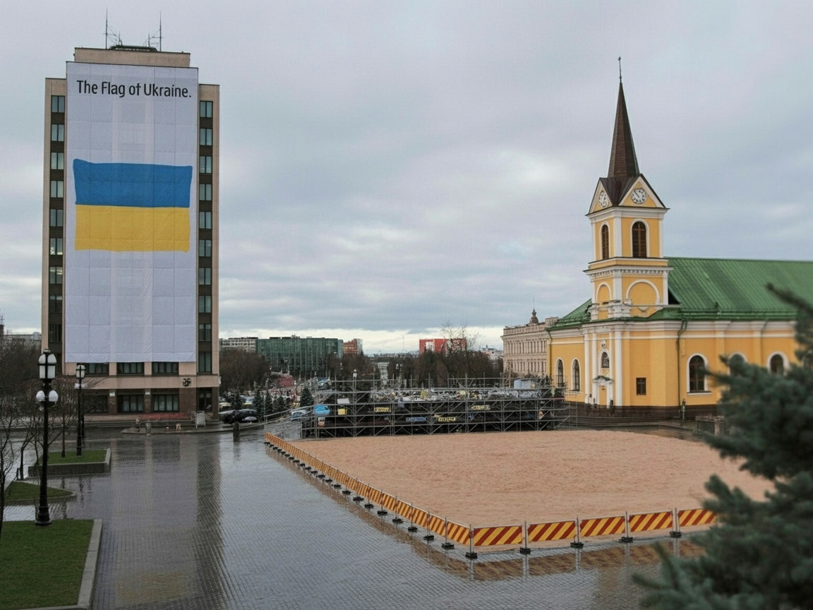 City square with Ukrainian flag and historic church