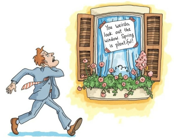 Man in Suit Passes Colorful Spring Window Display