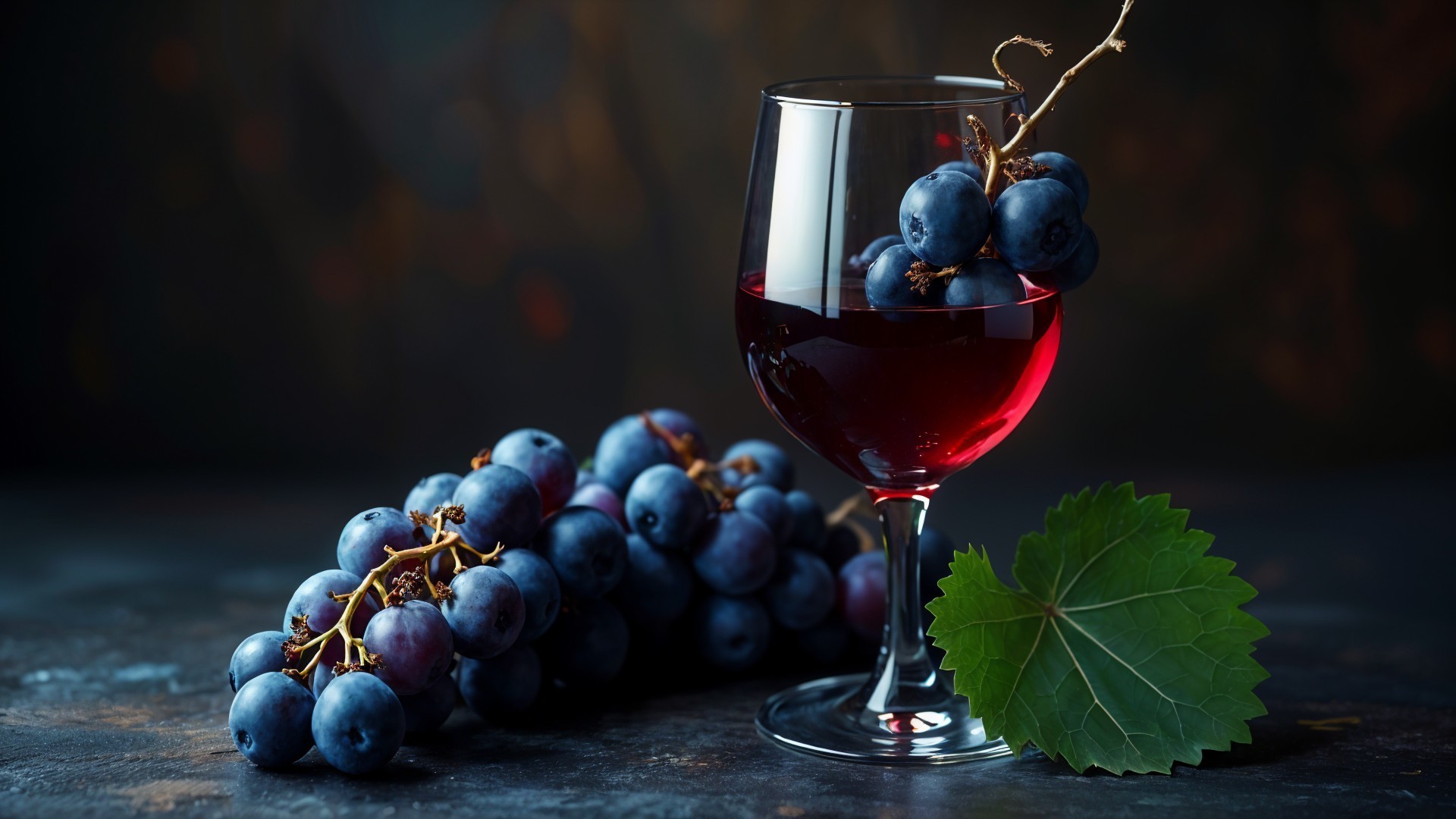 Elegant Glass of Red Wine with Dark Grapes and Leaf
