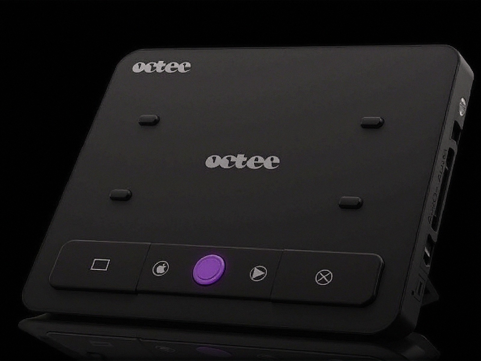 Sleek Black Device with Minimalist Design and Buttons