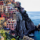 Coastal Village on Cliffs with Colorful Houses and Sea