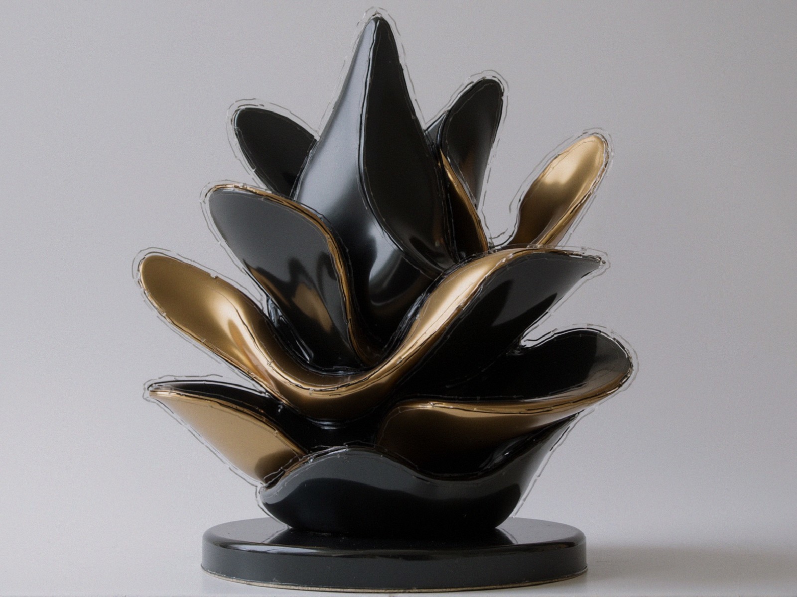 Abstract Plant-Inspired Decorative Sculpture in Black and Gold