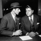 Vintage Suit Conversation in Moody Setting