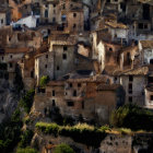 Stylized Houses in Warm Tones Against Dark Background