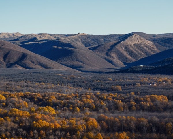 Panoramic Mountainous Landscape with Autumn Foliage