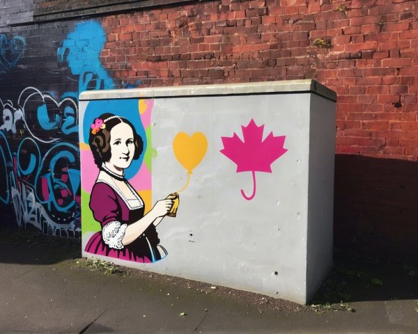 Colorful Mural on Concrete Electrical Box with Woman